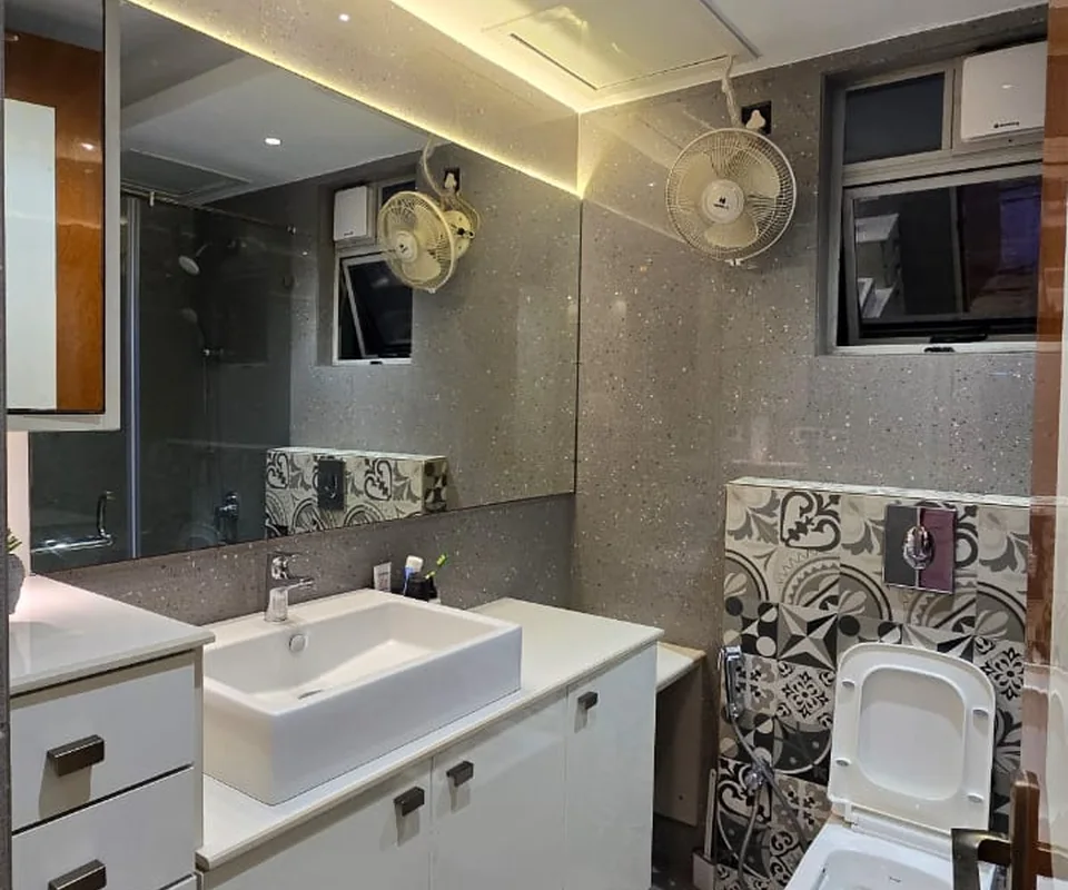 Bathroom with illuminated vanity